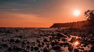 View and share our sunset backgrounds post and browse other hot wallpapers, backgrounds and images. Sea Sunset Stones Shore Light Picture Photo Desktop Wallpaper