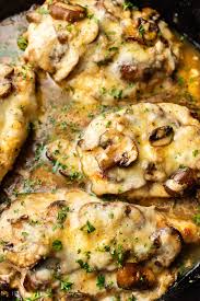 Easy Cheesy Pan Fried Chicken With A White Wine Mushroom Sauce That S Then Baked To Perfection With White Wine Chicken Stuffed Mushrooms Yummy Chicken Recipes