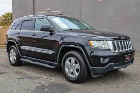 Image result for Brilliant Black 2012 Grand Cherokee