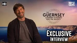 Juliet is more than intrigued. Michiel Huisman On Being Inspired By The Guernsey Literary And Potato Peel Pie Society Interview Youtube