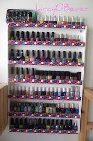 Giant nail polish is made with foam board. Diy Nail Polish Rack Using Duct Tape And Foam Boards Diy Nail Polish Rack Diy Nail Polish Foam Board Crafts