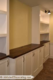 It's not light but is sure. My Diy Built In Bookshelves Wall Is Finished Addicted 2 Decorating Bookcase Diy Wall Bookshelves Bookshelves Built In