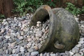 Love This Idea If I Had A Stone Garden I Would Do Something Like This Or Turn It Into River Rock Landscaping Rock Garden Landscaping Landscaping With Rocks