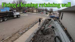 Trees often have invasive root structures that can also contribute to wall cracking. Fixing A Leaning Retaining Wall Youtube