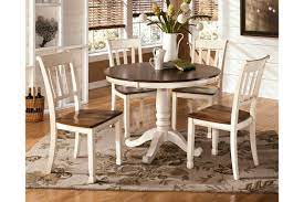 Whitesburg Dining Table And 4 Chairs Set Ashley Furniture Homestore In 2021 White Round Dining Table Round Dining Room Round Dining Table Sets