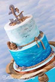There is a rope at the top of the second tier which wraps around the top tier of the cake and contrasts the colors. 45 Anchor Cakes Ideas Nautical Cake Cupcake Cakes Anchor Cakes