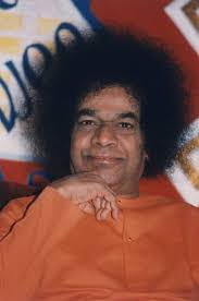 The wheelchair is needed no more Once Dr. Upadhyay and Professor Eric Arnott,  his teacher and mentor, had been called for interview by Swami in  Puttaparthi. When they came out they passed