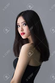 Take a look at these 20 asian with long hair and try any one of them out. Beautiful Young Asian Woman With Long Hair On Dark Gray Isolated Stock Photo Picture And Royalty Free Image Image 60566122