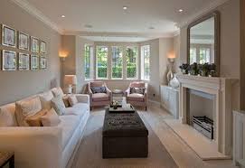 (imagine how busy this would have looked if all three sofas were different.). Design Ideas For A Rectangular Living Room