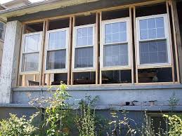 Enclosing a patio or porch can be a complex process. How To Enclose A Porch With Windows Hunker Porch Windows Sunroom Windows Screened In Porch Diy