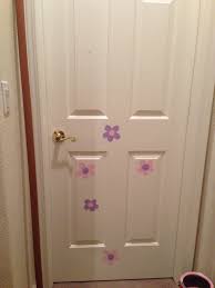 It is accessed to by a white door with pink blooms. I Painted My Door To Look Like Boo S Door In Monsters Inc Disney Nursery Monsters Inc Boo S Door
