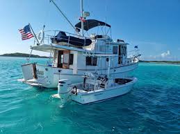 Please report if spotted. All are invited to visit and enjoy our beautiful  country but ALL of us MUST FOLLOW THE LAW. Update:- The couple onboard this  vessel were located, arrested and