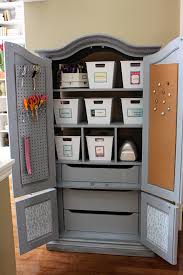 Storage cabinets are a great way to organize the busiest rooms in the house. Craft Armoire Craft Armoire Organization Furniture Craft Room Storage