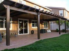 An aluminum patio cover with a traditional w style roof panel and extruded gutter design is an attractive and simple awning design. 42 Patio Cover Designs Ideas Patio Backyard Pergola