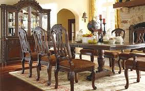 This opulent set is adorned with rich appliques: Ashley Furniture Homestore Independently Owned And Operated By Hamad M Al Rugaib Sons Trading Co North Shore