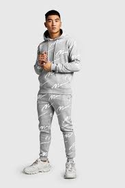 Hit up asos design for men's tracksuit bottoms and hoodies in a range of fits and colours, from classic black to bold patterns. All Over Man Printed Hooded Tracksuit Boohoo