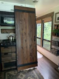 Diy 5' double sliding barn door hardware set cabinet roller track features 5 ft. How To Hang A Lightweight Sliding Barn Door In An Rv