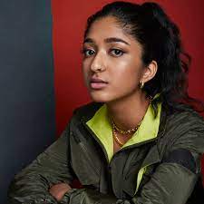 After all, she was named one of time100's next most influential people of 2021. Never Have I Ever Star Maitreyi Ramakrishnan On Connecting To Devi Accepting Your Culture And Talking About Mental Health Teen Vogue
