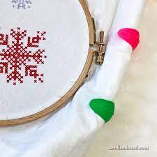 The embroidery hoops are interlocked. Embroidery Hoops Excess Fabric Huggers Needlenthread Com