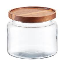 They come in numerous shapes and sizes with different types of lids as well. Anchor Hocking Montana Glass Canisters With Acacia Lids The Container Store