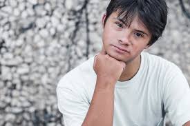 People used to say to me all the time that he “doesn't even look like he  has Down syndrome” or even better- “he doesn't look like he has *that* much  Down syndrome”.