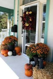 Paper lanterns spread from tree to tree can add a beautiful design element while playing double duty as extra lighting once the sun sets. Rustic Fall Porch Decor Ideas Diy Cuteness