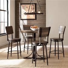 Paired with backless stools, counter tables are easier to use while standing or for getting up and down more quickly. Hillsdale Jennings Rustic 5 Piece Counter Height Dining Set With Swivel Stools Conlin S Furniture Pub Table And Stool Sets