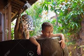 5 ways you're cleaning your. Happy Baby Son With Mother Have Fun In Bath Playful Woman Spraying Stock Photo Picture And Royalty Free Image Image 108271638