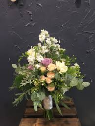 Arrive alive provides a 36 hour water supply for hand tied bouquets. Peachy Bridal Bouquet Eucalyptus Leaves Sliver Leaf Cool Water Rose White Wax Flower White Phl White Wedding Bouquets White Wax Flower Flower Arrangements
