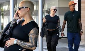 She is a american business executive. Amber Rose Steps Out With Her Boyfriend Alexander Edwards Ahead Of Son S Birth Daily Mail Online
