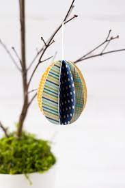 Use the eggs as fun coloring pages or decorate them by gluing various materials like paper, stickers, buttons or washi tape. How To Make Paper Easter Egg Ornaments