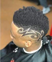 In fact, your adorable little boy can pretty much get any type of haircut a black man can. Black Boy Side Design Haircut Hair Designs For Boys Black Boys Haircuts Haircut Designs