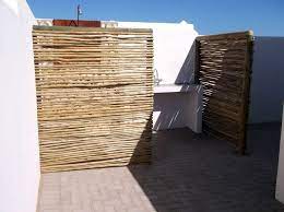 Some outdoor shower kits come with a solar heating capacity, offering the best of both worlds! Outdoor Shower Screen Of Latte Trademark Property Maintenance Projects