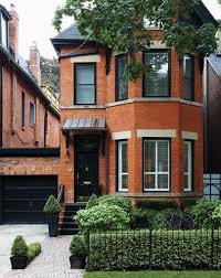 Black window frames can serve as bold accent points, underscoring the rest of your home's aesthetics. Black Windows On Red Brick House Uk Novocom Top