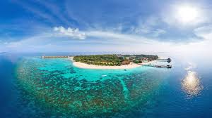Maldive islands resort, brown nipa huts, travel, ocean, exotic. Reethi Faru A Kuoni Hotel In Maldives