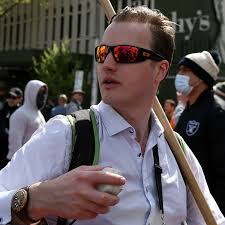 Anti-lockdown protest organiser charged with incitement over Melbourne  rally