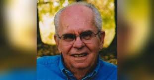 John W. Buman Obituary