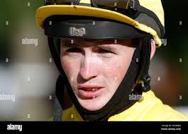 Jockey Dylan Hogan at Windsor Racecourse Stock Photo