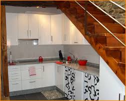 A final stair leads up to a roof garden. Kitchen Design Under Stairs Home Design