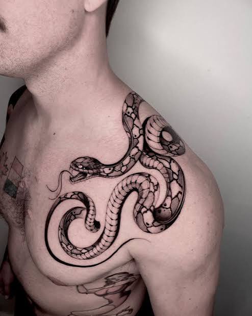 Sneaky Style: Unleashing the Power of The Snake Tattoo - tattoogenda.com