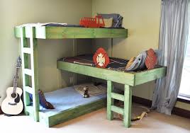 A ladder is used to get up to the top bunk. I Just Downloaded These Free Plans For This Triple Bunk Bed With The Combination Of Both My Dad And I S Carpentry Diy Bunk Bed Bunk Bed Plans Triple Bunk Bed
