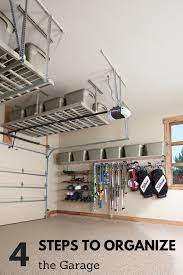 A garage organizer can store brooms and shovels, corral boxes and gear, and securely get items off your garage's floor. 4 Steps For Organizing The Garage Time 4 Organizing Garage Decor Overhead Garage Storage Garage Organization