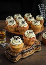 Since the cake is warm, as you brush it all over with the syrup it soaks in the flavor and moisture of the syrup. Rum And Raisin Cupcakes Recipe Katiecakes