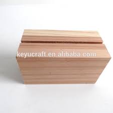 I think this wooden business card holder by the merrythought is pretty. Custom Wooden Holder For Phone Menu Napkin Number Holders Place Card Holders Buy Diy Wood Card Holder Wood Business Card Holder Wood Mobile Phone Holder Product On Alibaba Com