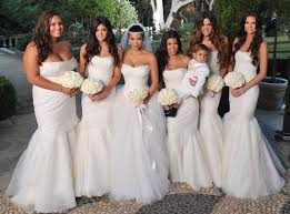 Kim laughed and whispered to kris during all of the 'girlie' references in the play, particularly mentions of vera wang wedding dresses and hermes kelly bags, according. Photos From Kim Kardashian S Wedding Album E Online