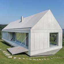 robert konieczny uses drawbridge to create ark like house on a steep polish hillside betonhaus haus architektur architekt design