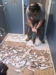 We prefer ceramic or porcelain tile in bathrooms. How To Remove Tile Flooring Tile Removal Removing Bathroom Tile Tile Floor