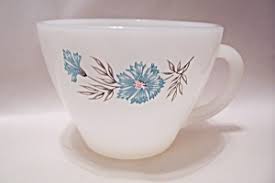 Renowned for their depression glass sets, the newly minted anchor hocking company, circa 1937, embraced this cultural move towards buying colorful but practical everyday kitchenware. Fire King Anchor Hocking Blue Flower Pattern Cup Glass Fire King Cups Saucers At Fort Logan Antiques And Collectibles