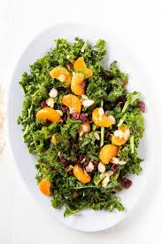 Stir in couscous, cover with plastic wrap and let stand 5 minutes. Autumn Kale Salad With Mandarin Orange Vinaigrette A Zesty Bite