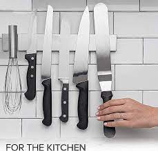 A man is sharpening a damascus steel knife on a water whetstone. Buy Modern Innovations 10 Inch Stainless Steel Magnetic Knife Bar With Multipurpose Use As Knife Holder Knife Rack Knife Strip Kitchen Utensil Holder Tool Holder Art Supply Organizer Home Organizer Online In